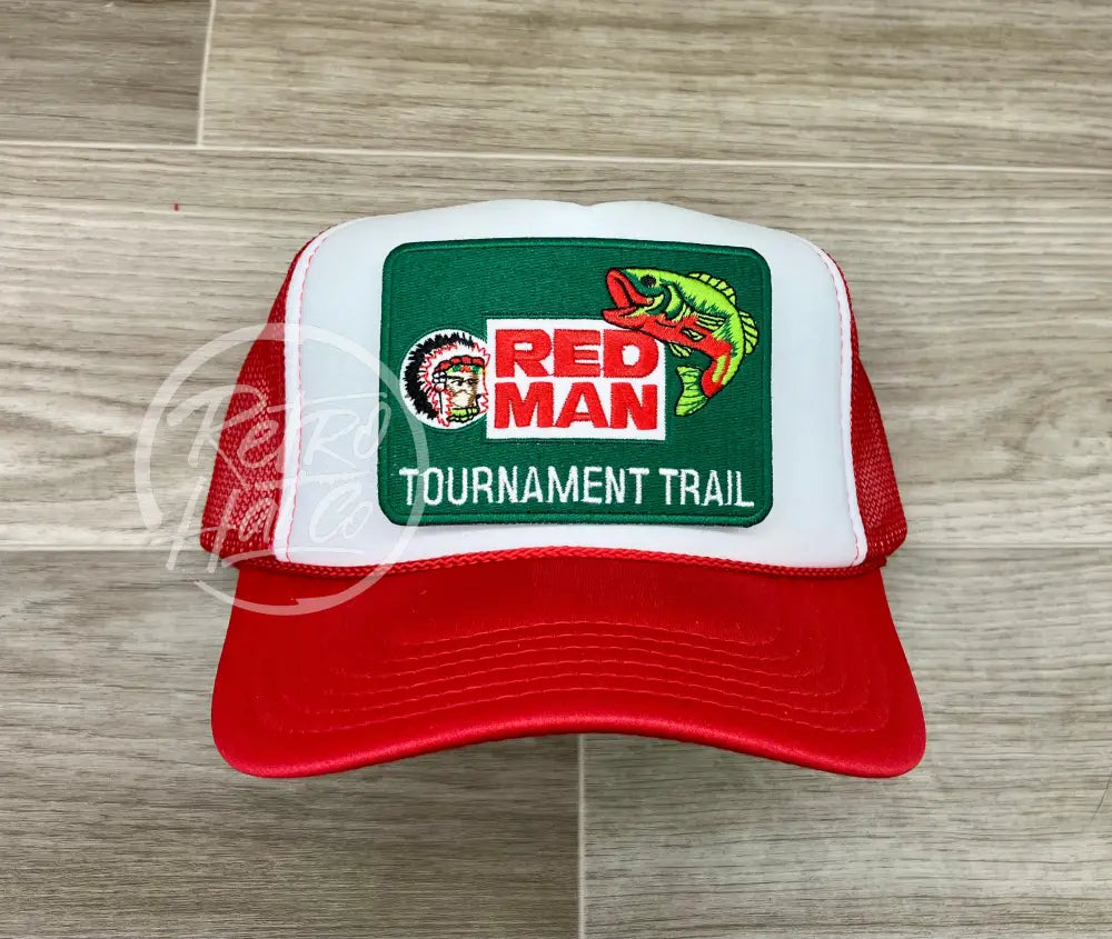 Red Man Tournament Trail Bass Fishing Patch on Red/White Meshback Trucker Hat