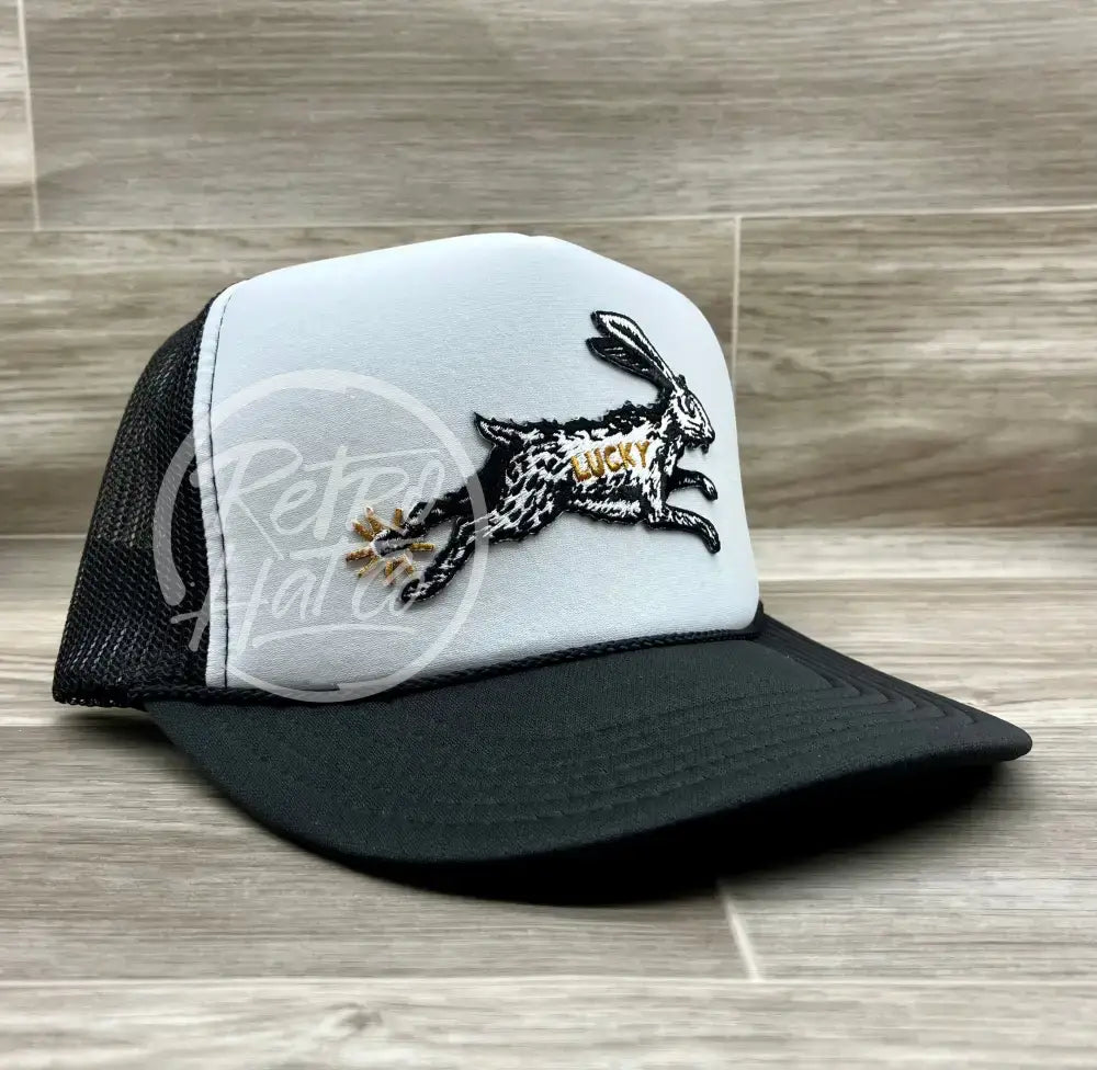 Lucky Rabbit on Black/White Meshback Trucker Hat