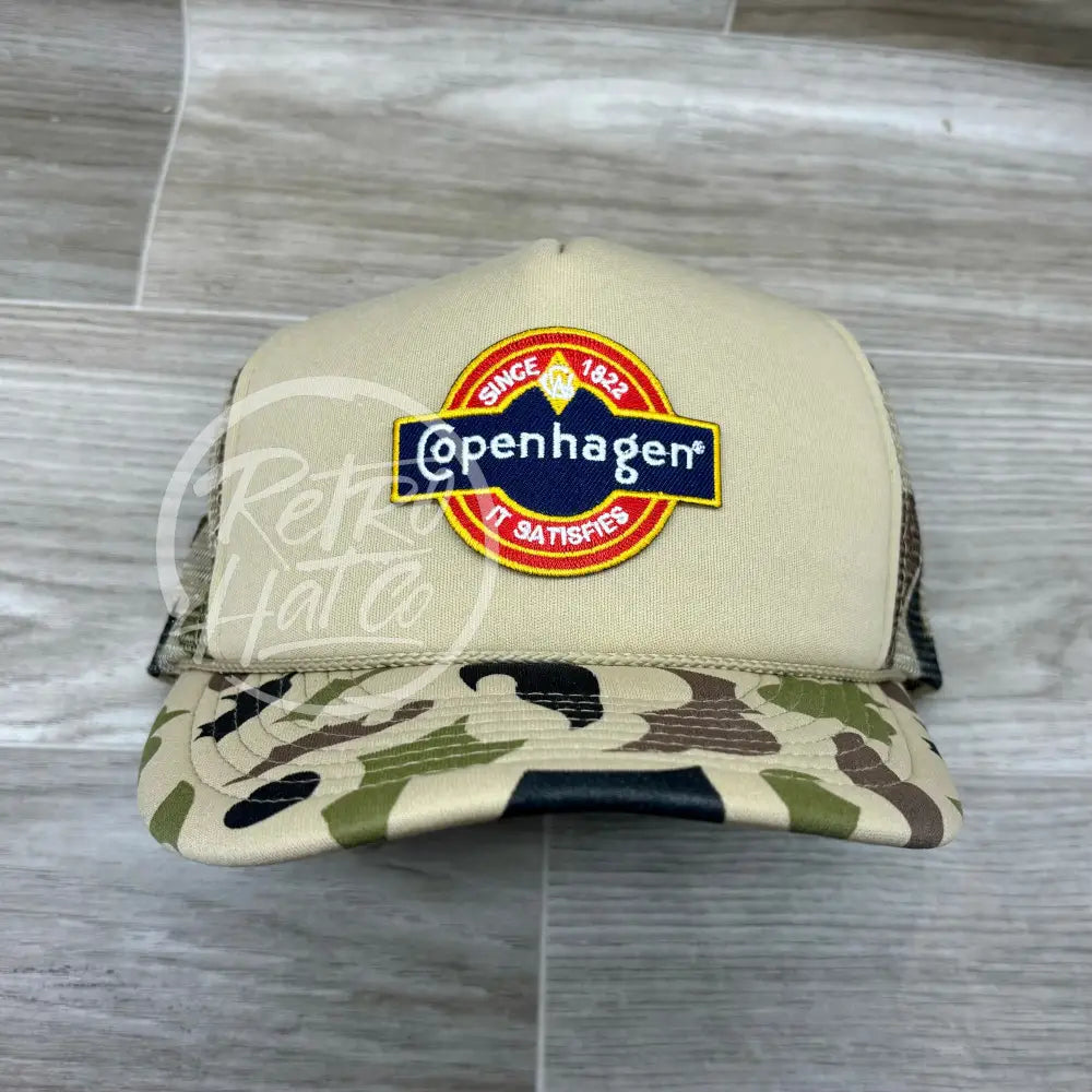 Copenhagen Patch on Solid Front Beige / Camo Meshback Trucker Hat