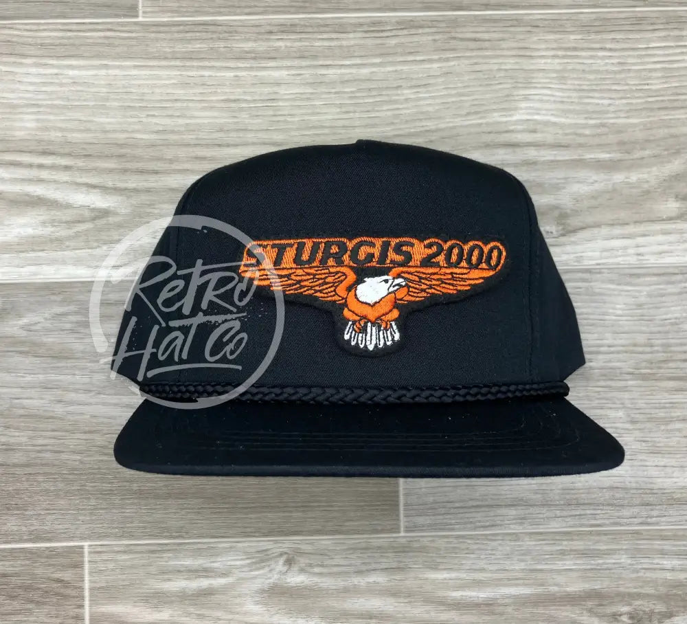 Vintage Sturgis 2000 (large orange eagle) Patch on Black Classic Rope Hat