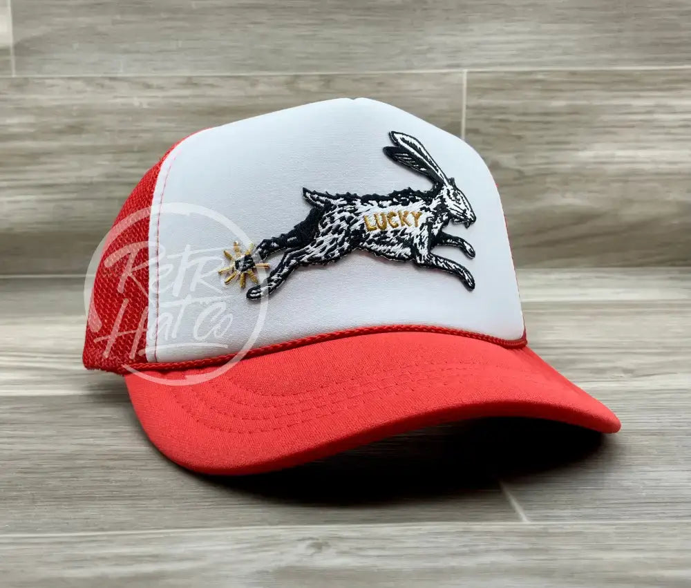 Lucky Rabbit on Red/White Meshback Trucker Hat