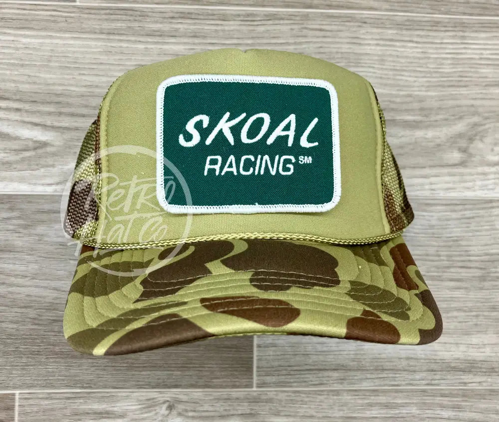 Skoal Racing (Green) on Solid Front Camo Trucker Hat