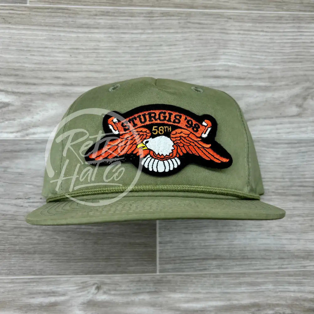 Vintage ‘98 Sturgis Orange Eagle Patch on Olive Retro Rope Hat