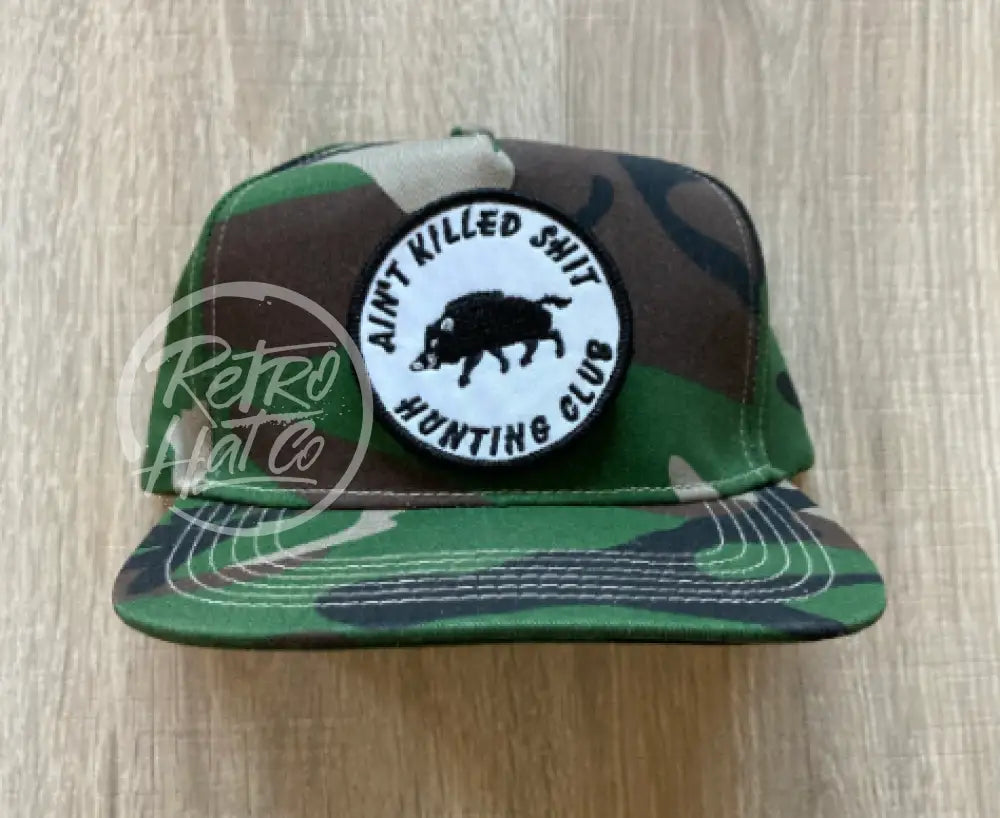 Ain’t Killed Sh!t on Woodland Camo Retro Hat