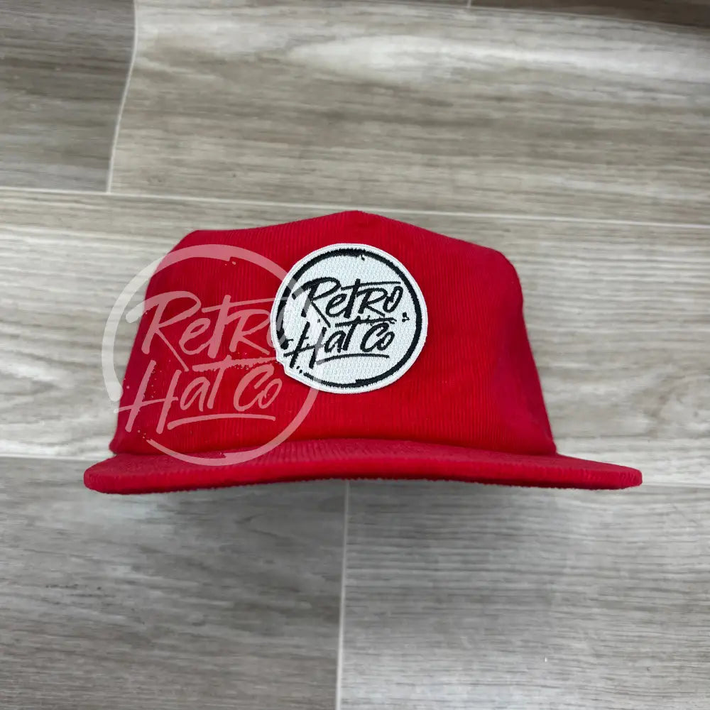 Retro Hat Co. Brand Patch (white) on Red Corduroy Hat