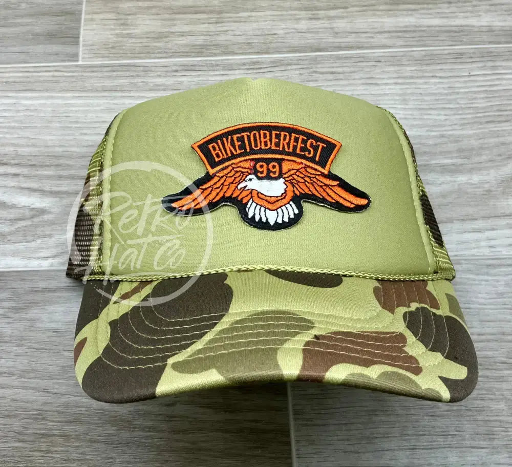 Biketoberfest ‘99 Patch on Solid Front Camo Meshback Trucker Hat (1 of 1)