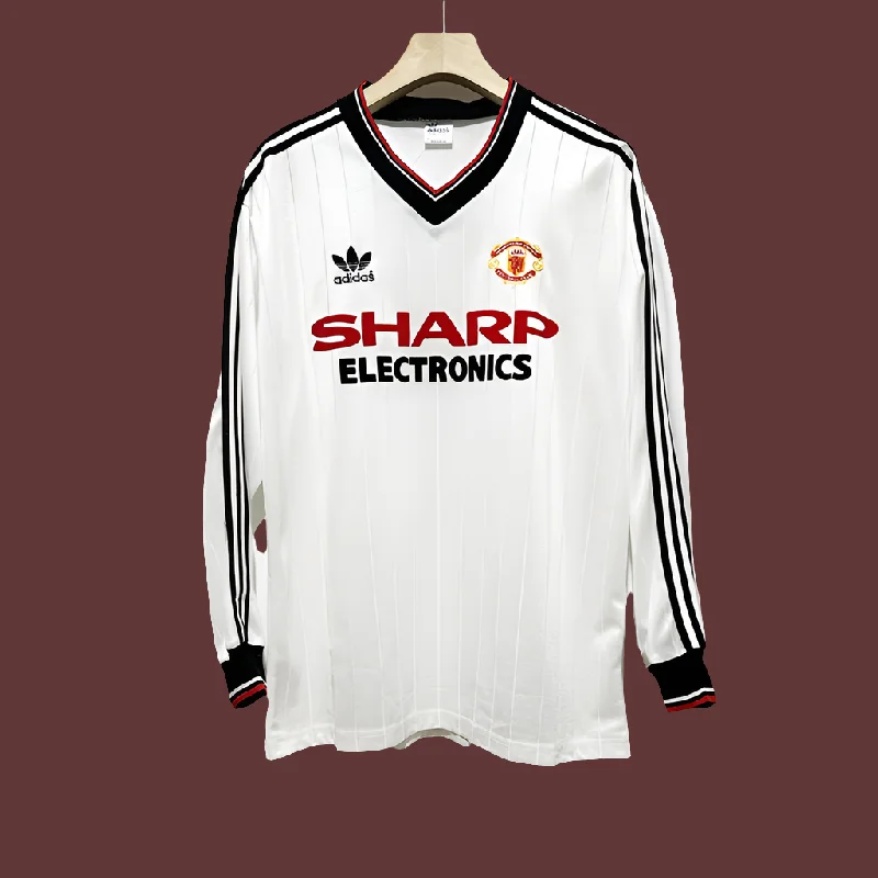 Manchester United 1982.83 away manga larga used