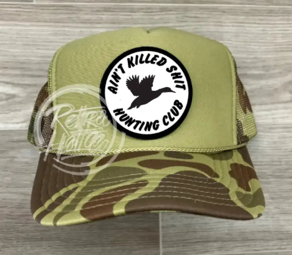 Ain’t Killed Sh!t (Duck) on Solid Front Camo Meshback Trucker Hat