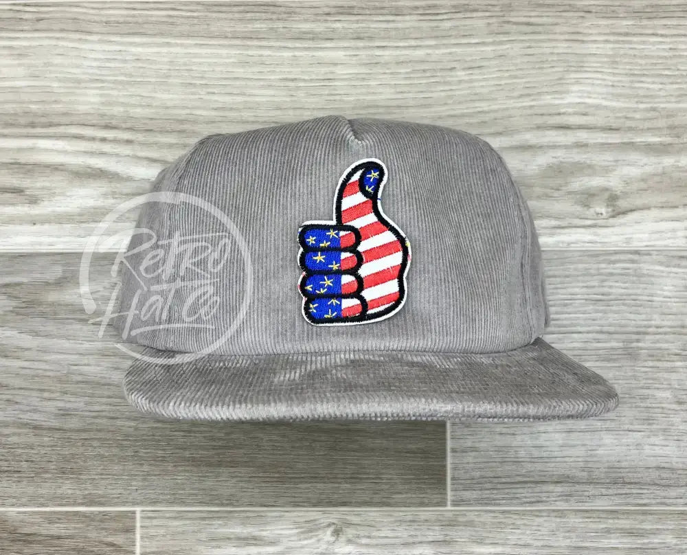 American Thumb on Gray Corduroy Hat